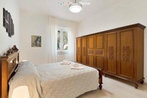 Postel nebo postele na pokoji v ubytování Giuly House, Terre Marine