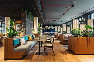 Ein Sitzbereich in der Unterkunft Hotel Schani UNO City
