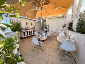 Patio alebo iná vonkajšia časť ubytovania San Michele Luxury Rooms