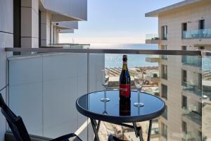 Drinks på Sunset View Apartment in Infinity Beach Resort - parking