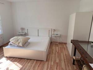 Postel nebo postele na pokoji v ubytování Ferienwohnung Hinzweiler