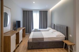 Postel nebo postele na pokoji v ubytování Te Aldo Hotel + 84 fotografií