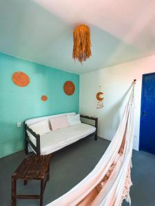 Llit o llits en una habitació de Beco do Preá - Kite Apartamentos e Suítes Beira Mar