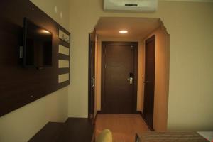 TV a/nebo společenská místnost v ubytování Hotel Avci