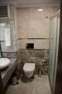 Koupelna v ubytování Hotel Avci