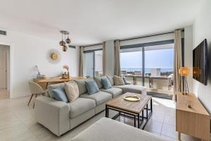 Et tv og/eller underholdning på Corasol - Atico de 3 dormitorios con vistas al mar