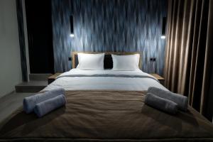 Voodi või voodid majutusasutuse EVN Rooms toas