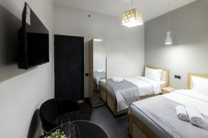 Voodi või voodid majutusasutuse EVN Rooms toas