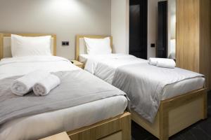 Voodi või voodid majutusasutuse EVN Rooms toas