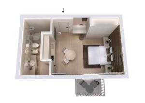 un plano del piso de una habitación en Evangelisti Palace, en Bellaria-Igea Marina