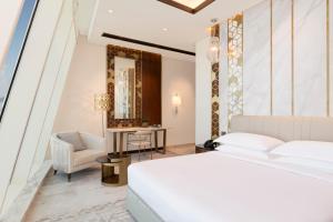 Vuode tai vuoteita majoituspaikassa Velero Hotel Doha Lusail