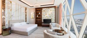 Vuode tai vuoteita majoituspaikassa Velero Hotel Doha Lusail