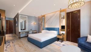 Vuode tai vuoteita majoituspaikassa Velero Hotel Doha Lusail