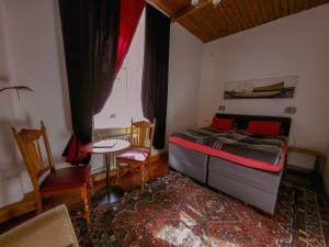 Postel nebo postele na pokoji v ubytování Villa Meretare