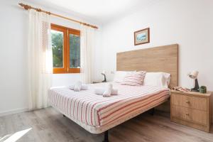 Postel nebo postele na pokoji v ubytování Villa CANTALITA, Muro Beach, Alcudia