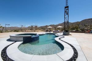 The swimming pool at or close to Renovated Lodge - Room 3 with pool access