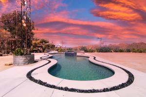 The swimming pool at or close to Renovated Lodge - Room 3 with pool access