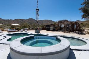 The swimming pool at or close to Renovated Lodge - Room 3 with pool access