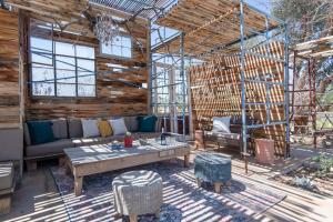 A restaurant or other place to eat at Renovated Lodge - Room 3 with pool access