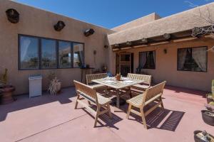 A patio or other outdoor area at Renovated Lodge - Room 3 with pool access