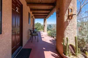 A balcony or terrace at Renovated Lodge - Room 3 with pool access