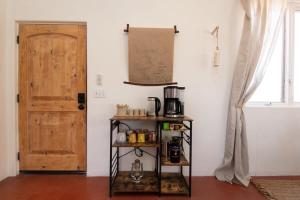 Coffee and tea making facilities at Renovated Lodge - Room 3 with pool access