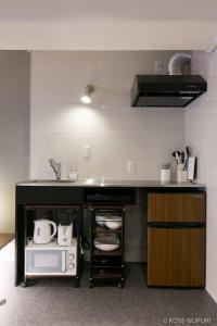 Virtuvė arba virtuvėlė apgyvendinimo įstaigoje bHOTEL Origaminn 503 - 5 mins PeacePark