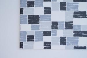 een schilderij aan de muur met zwarte en witte vierkanten bij b hotel Ball Park - 2mins walk Baseball 5mins walk Hiroshima Sta in Hiroshima