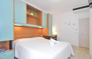 Voodi või voodid majutusasutuse Hotel Rex toas