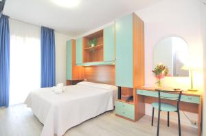 Voodi või voodid majutusasutuse Hotel Rex toas