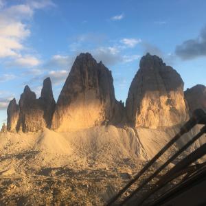 a view of the desert with mountains in the background at Fedaia Joy B&B in Canazei