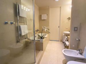 Koupelna v ubytování Best Western Plus Hotel Le Favaglie