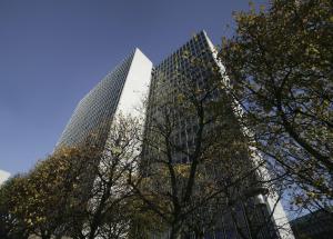 dos edificios altos con árboles delante de ellos en Scandic Copenhagen, en Copenhague