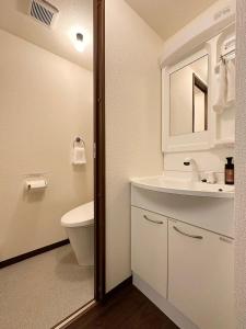 Koupelna v ubytování Nagomi by b hotel - Luxe Apartment Near the City Center for 3Ppl