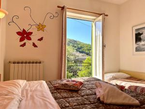 Photo de la galerie de l'établissement Agriturismo "Villa Rosa" Arzeno, à Ne