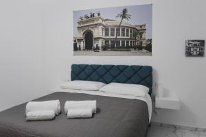 Ліжко або ліжка в номері Mariblu Palermo