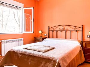 Postel nebo postele na pokoji v ubytování Casa rosa del romeral