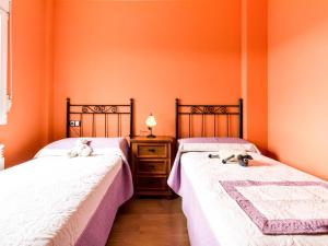 Postel nebo postele na pokoji v ubytování Casa rosa del romeral