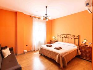 Postel nebo postele na pokoji v ubytování Casa rosa del romeral