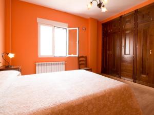 Postel nebo postele na pokoji v ubytování Casa rosa del romeral