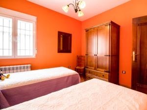 Postel nebo postele na pokoji v ubytování Casa rosa del romeral
