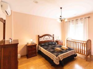 Postel nebo postele na pokoji v ubytování Casa rosa del romeral