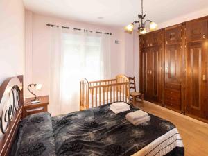 Postel nebo postele na pokoji v ubytování Casa rosa del romeral