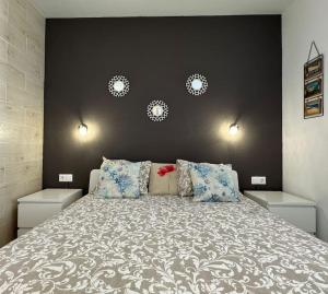 Łóżko lub łóżka w pokoju w obiekcie Palm Garden Apartment