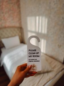 Voodi või voodid majutusasutuse Armenia Hotel toas