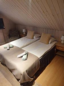 Letto o letti in una camera di Gits Gard