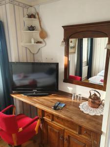 TV o dispositivi per l'intrattenimento presso Gits Gard