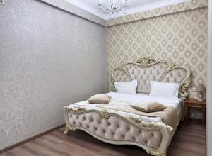 Voodi või voodid majutusasutuse Armenia Hotel toas