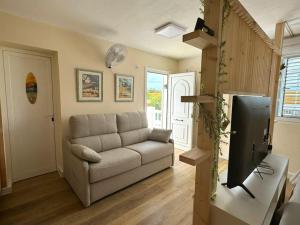 TV a/nebo společenská místnost v ubytování Casa Paradiso - relax y playa