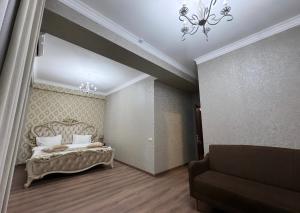 Voodi või voodid majutusasutuse Armenia Hotel toas